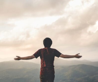 Happy Man Freedom in sunrise nature Successful concept