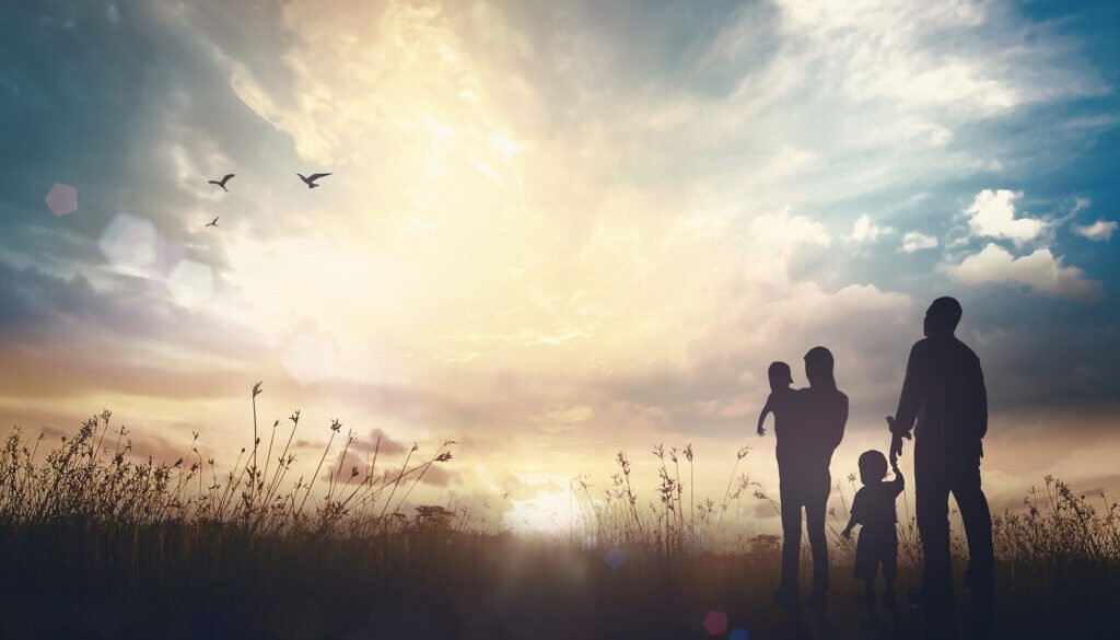 Family worship God concept: Silhouette people looking for the cr